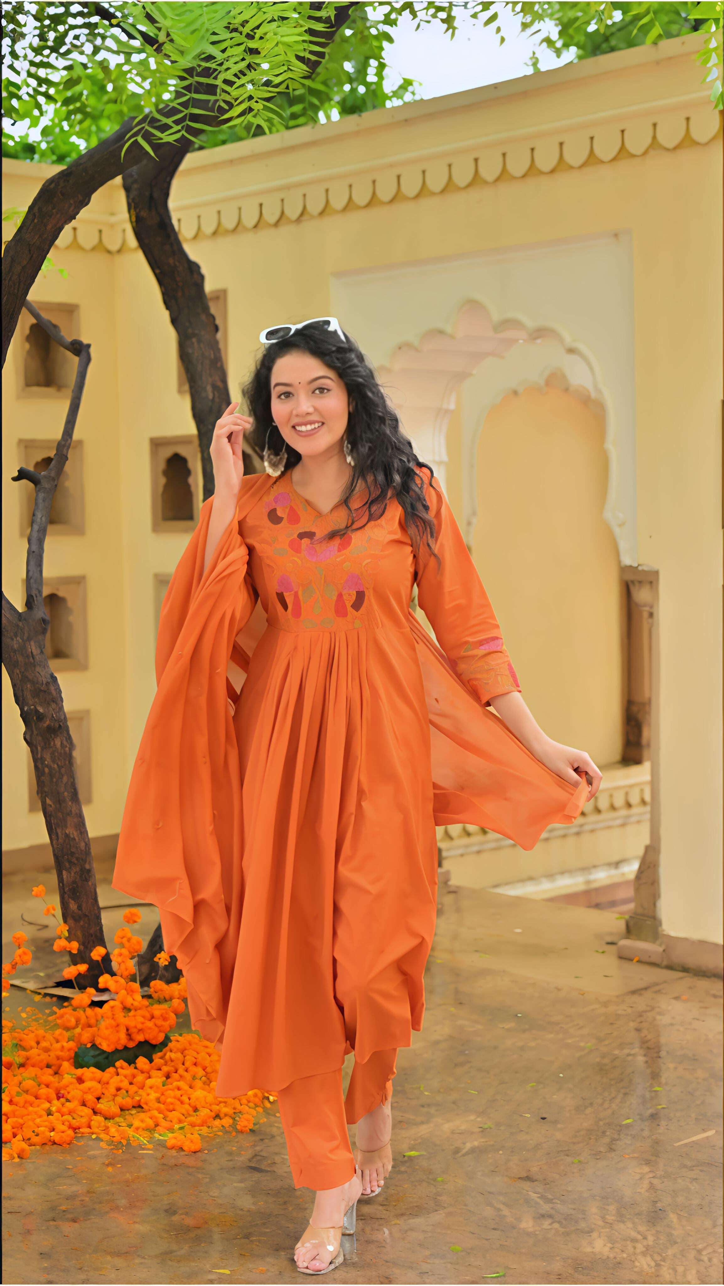 Belveera Embroidered kurta pant dupatta set in orange with intricate floral embroidery for festive occasions