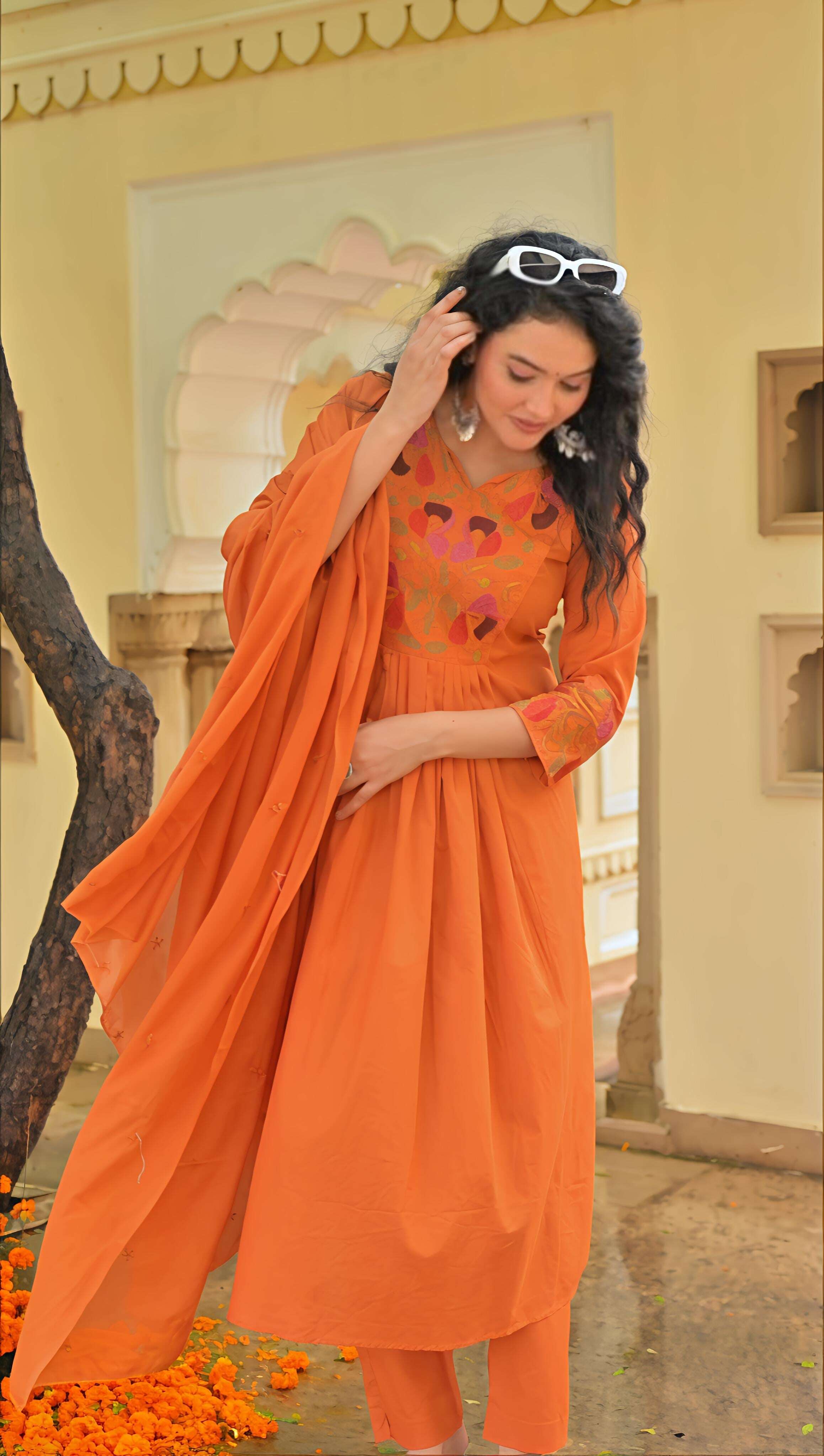 Elegant Belveera embroidered kurta pant dupatta set in orange with intricate floral design