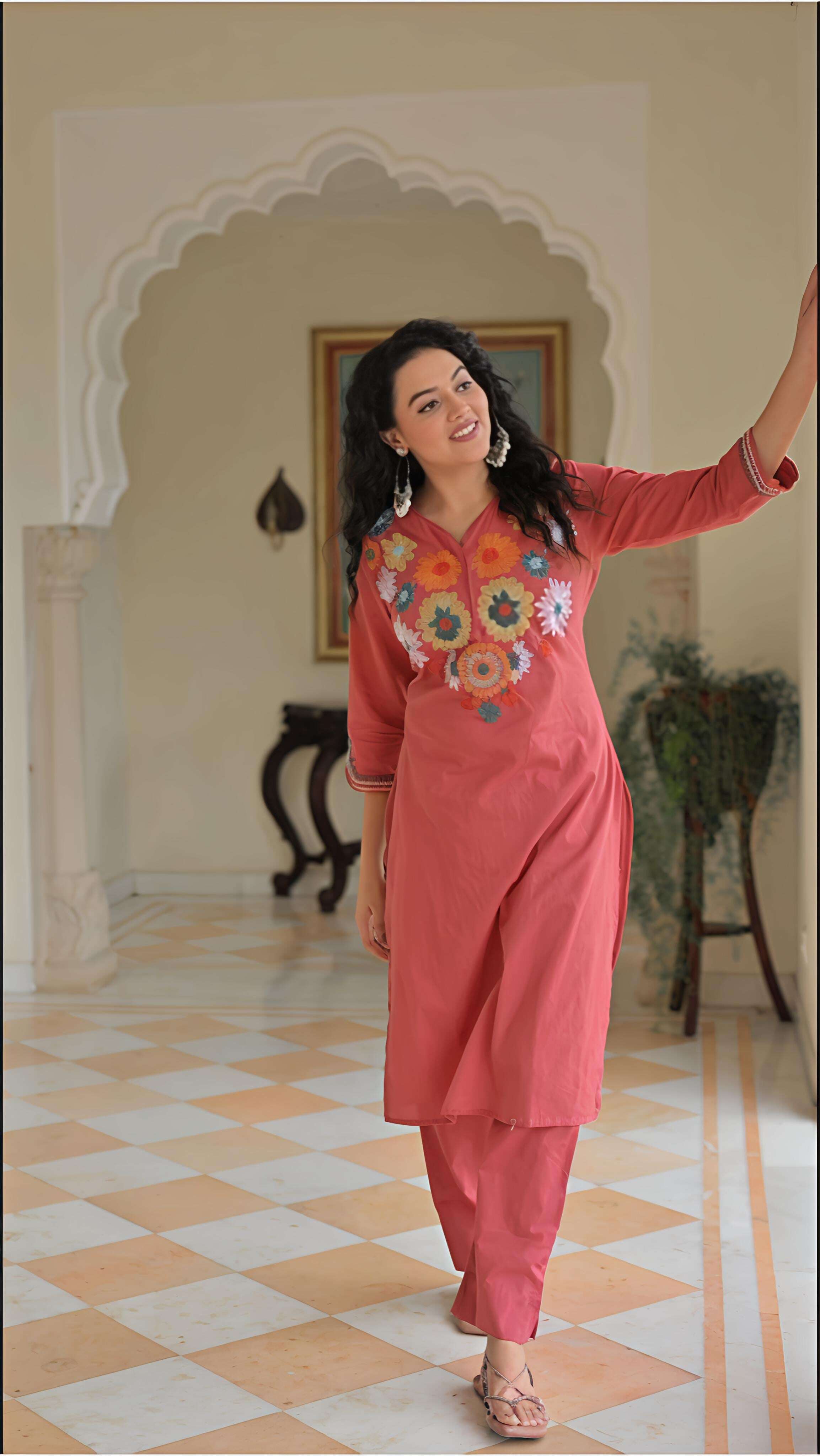 Beautiful embroidered kurta pant set for women in coral with floral design, perfect for casual occasions