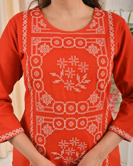 Belveera floral printed kurta pant set featuring intricate embroidery on a vibrant orange fabric