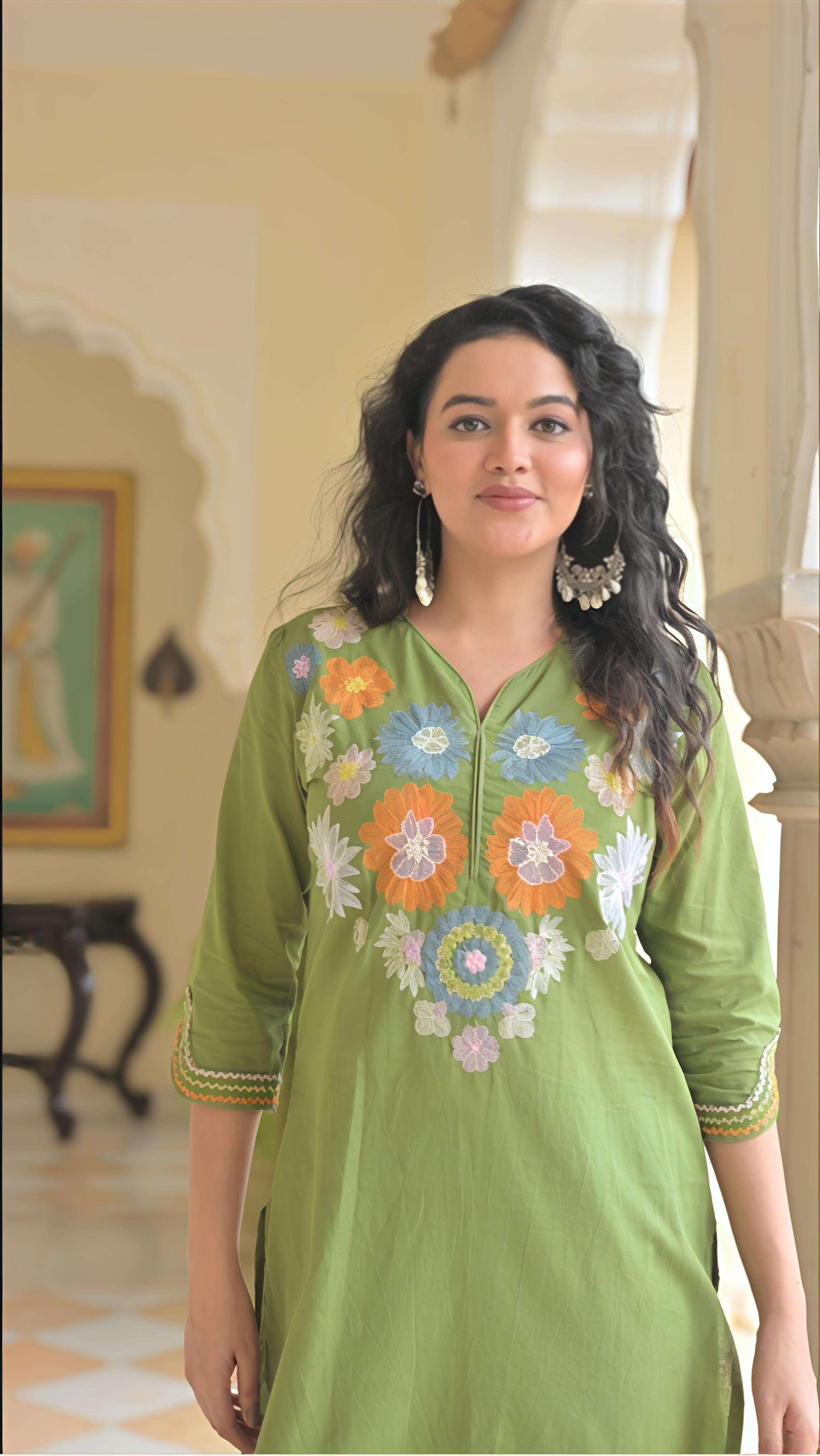 Belveera green cotton kurta set for women with floral embroidery and stylish design