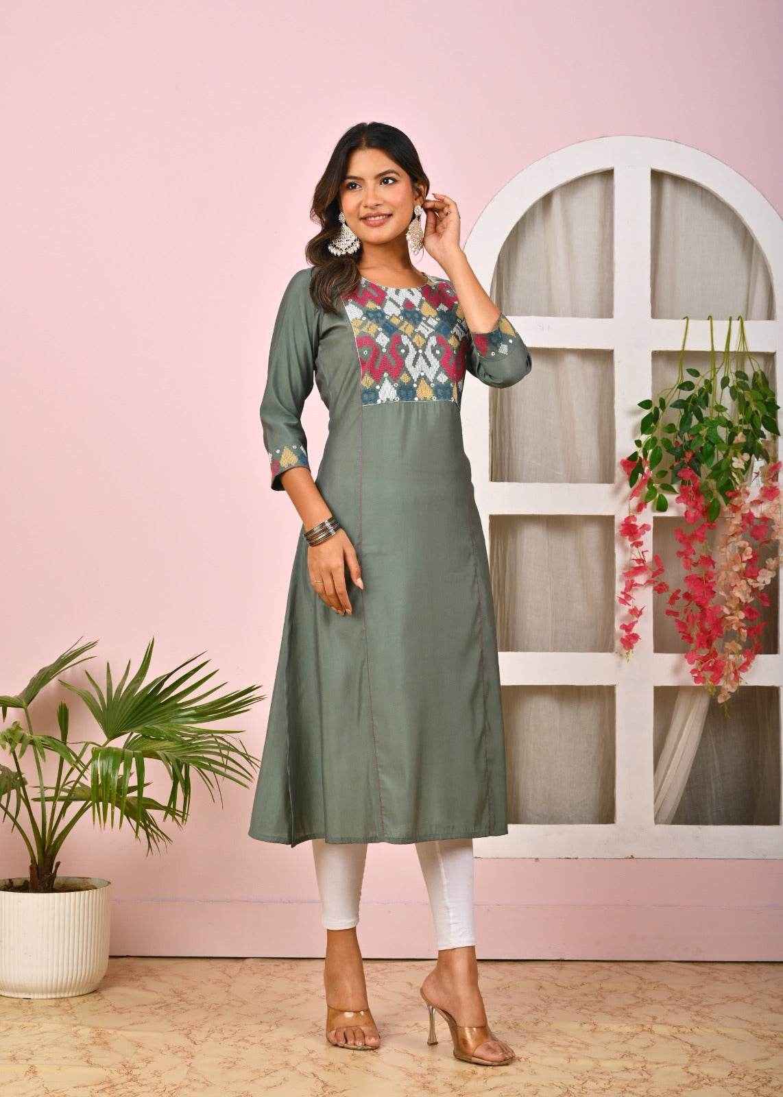 Belveera green embroidered kurta for women with stylish neckline and floral patterns, perfect for casual wear