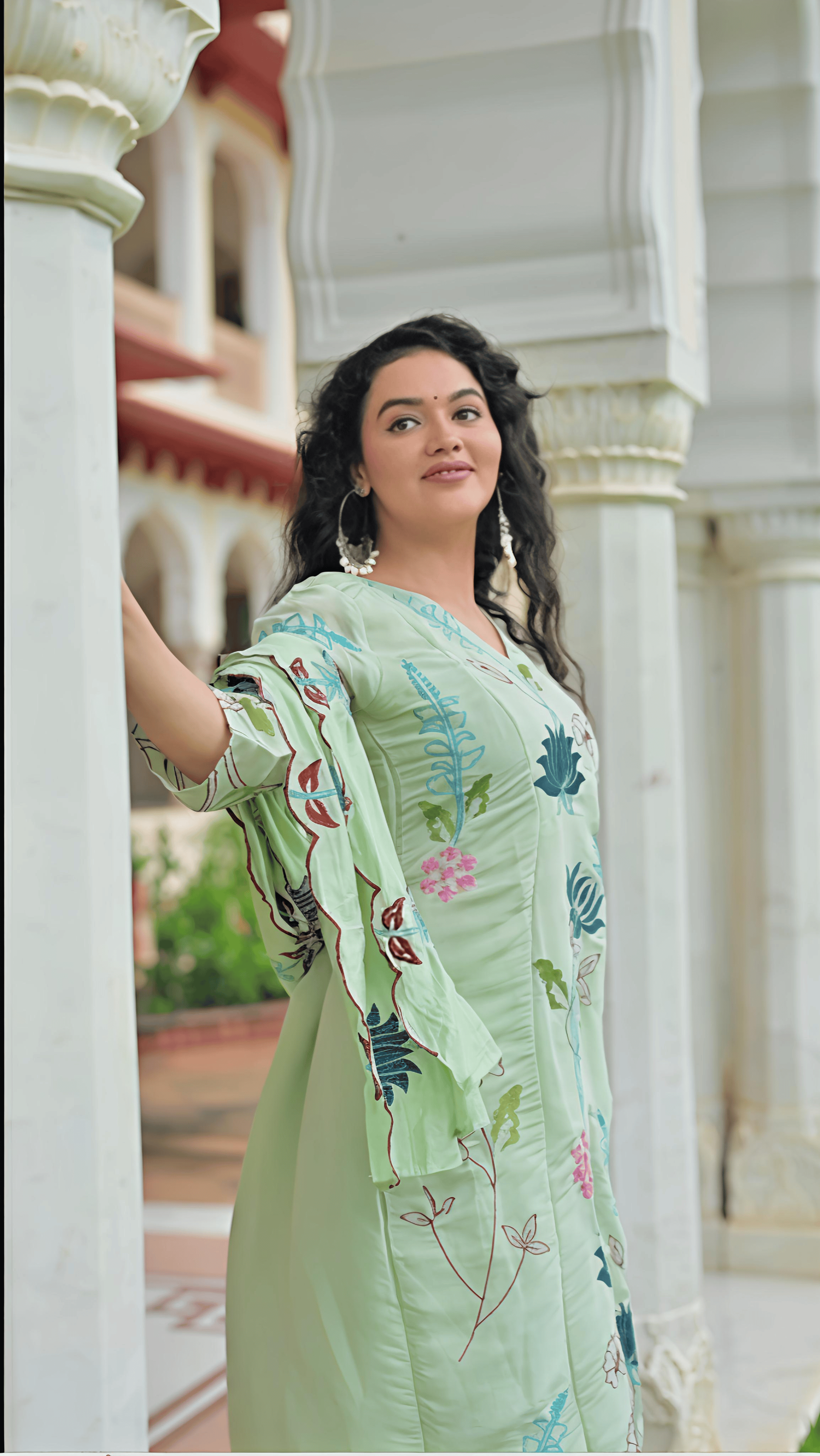 Elegant light green Chanderi suit set with floral embroidery, perfect for festive occasions