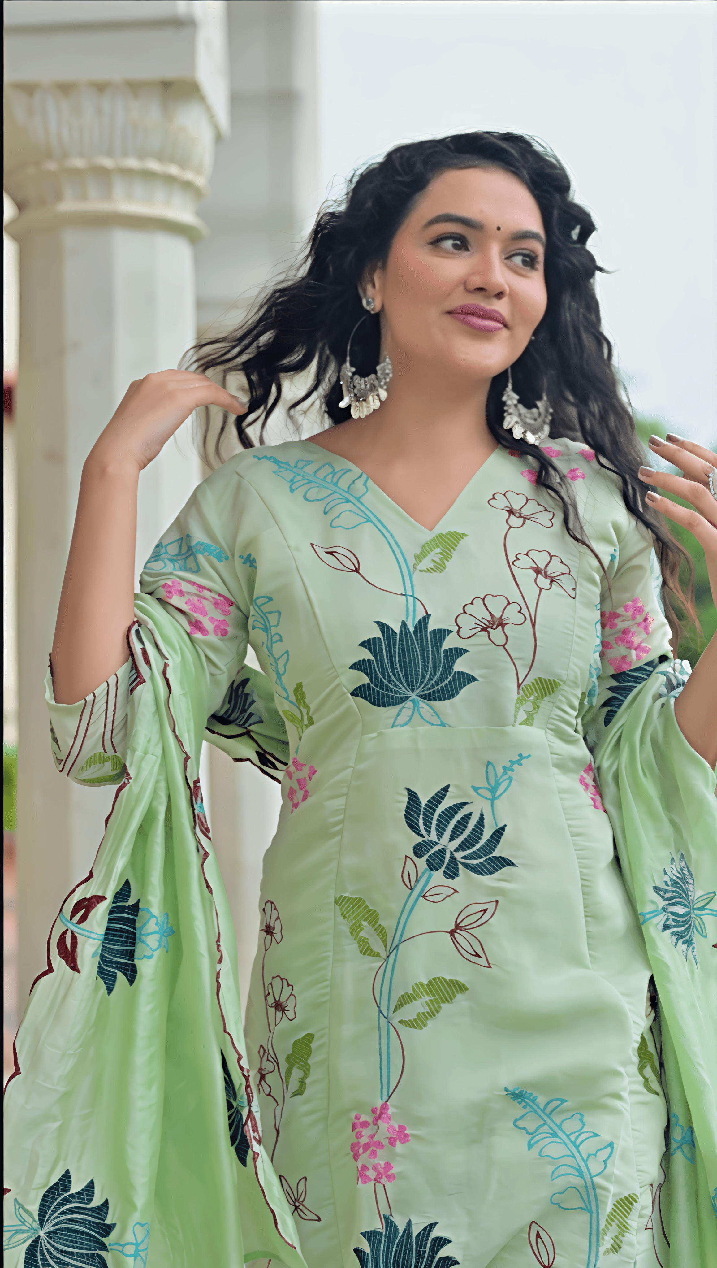 Elegant light green Chanderi suit set with floral embroidery and stylish sleeves