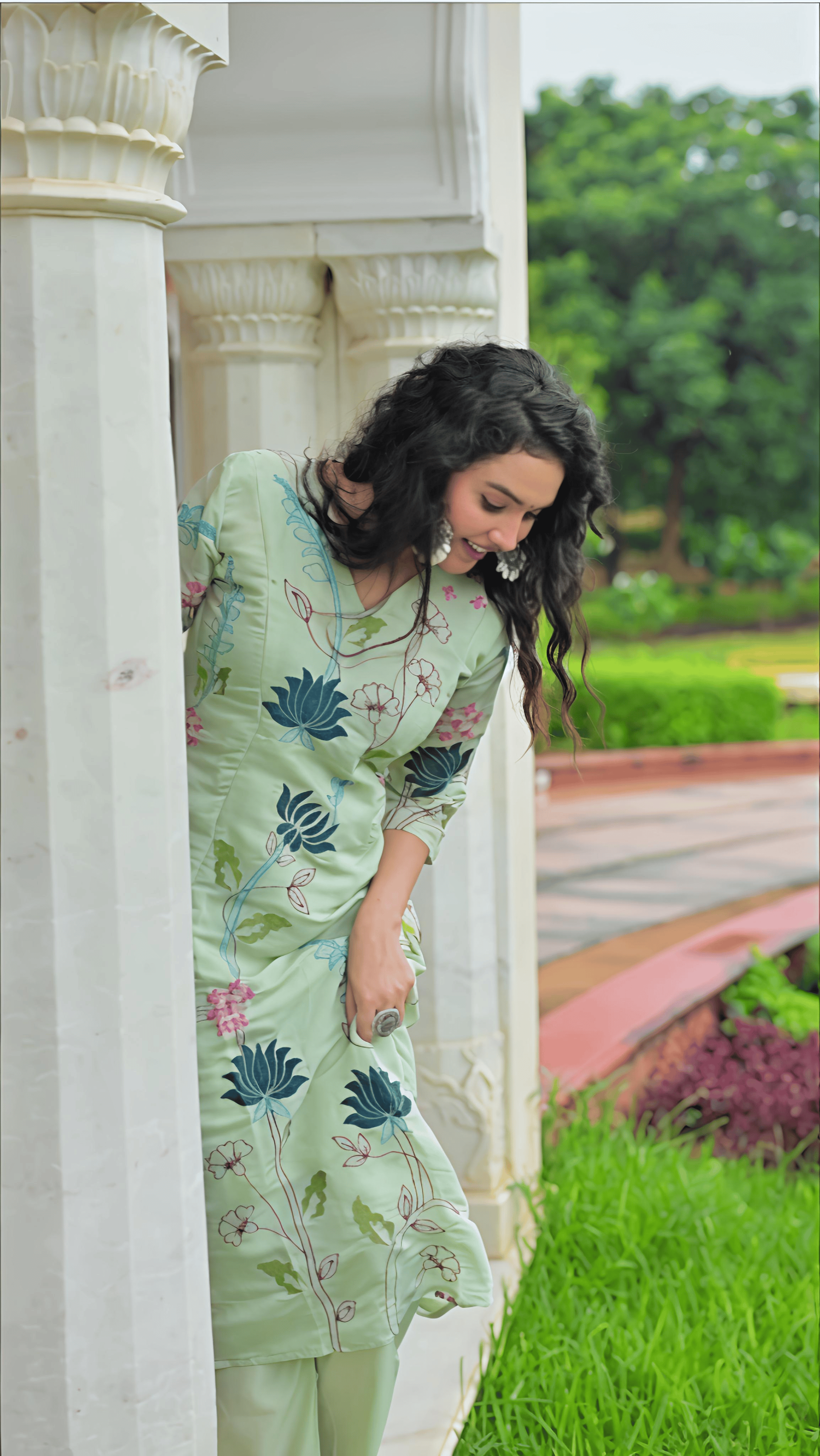 Elegant light green Chanderi suit set with floral patterns, perfect for festive occasions