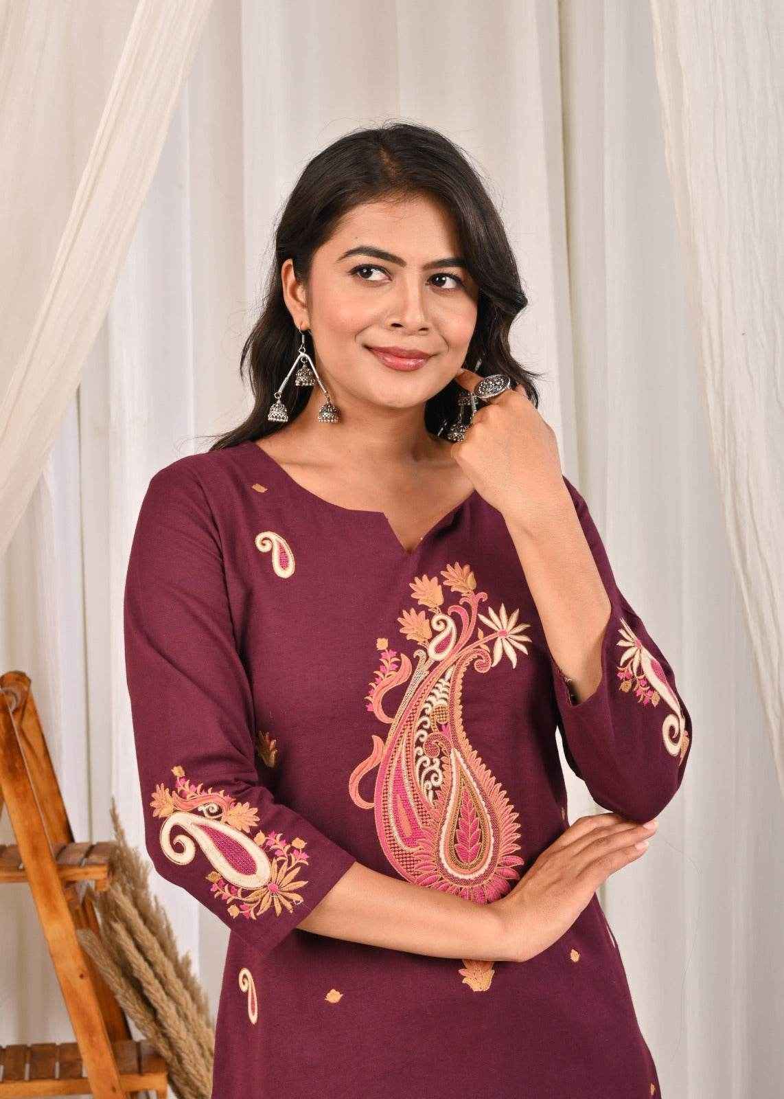 Elegant multicolour wine kurta pant set featuring intricate paisley embroidery on a rich background