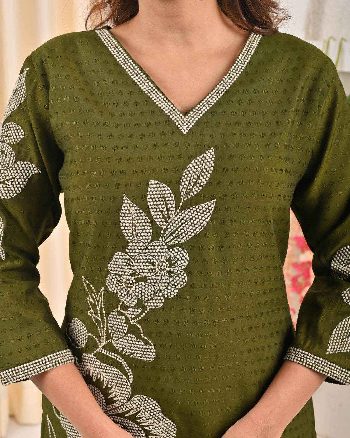 Olive green embroidered kurta with floral design and V-neckline for elegant style