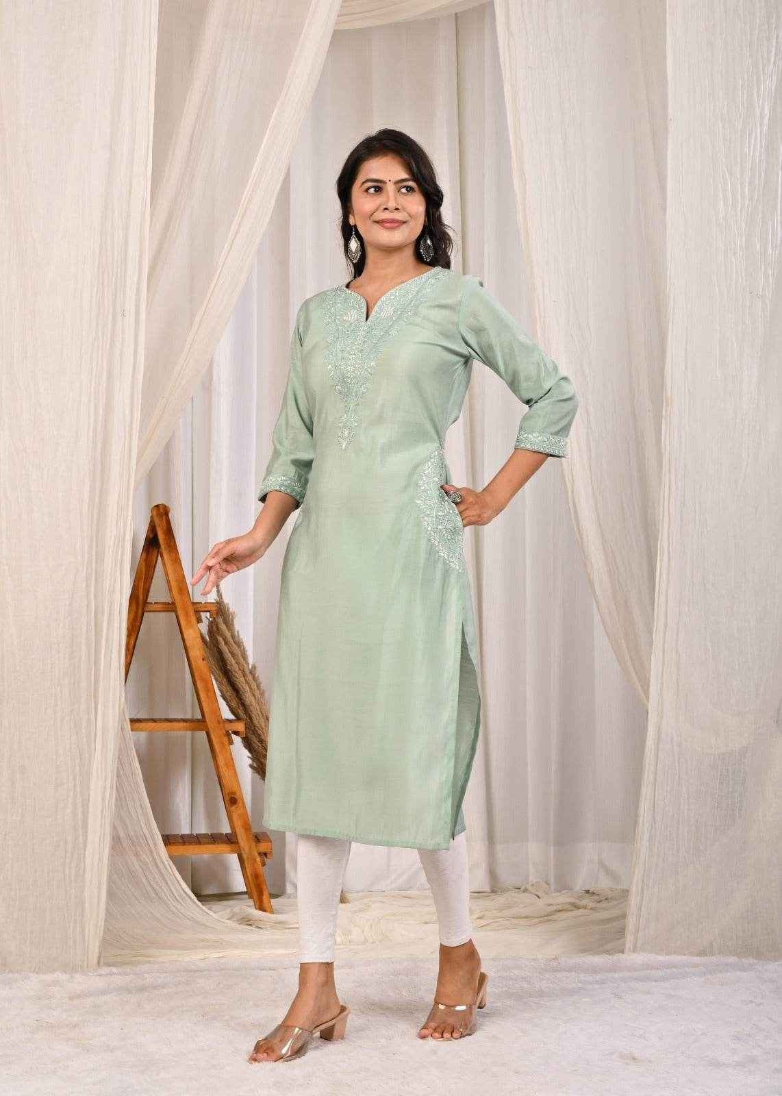 Elegant pastel mint green silk kurta with embroidered detailing, perfect for festive occasions