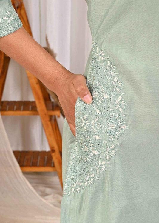 Pastel mint green silk kurta featuring intricate embroidery and a convenient side pocket