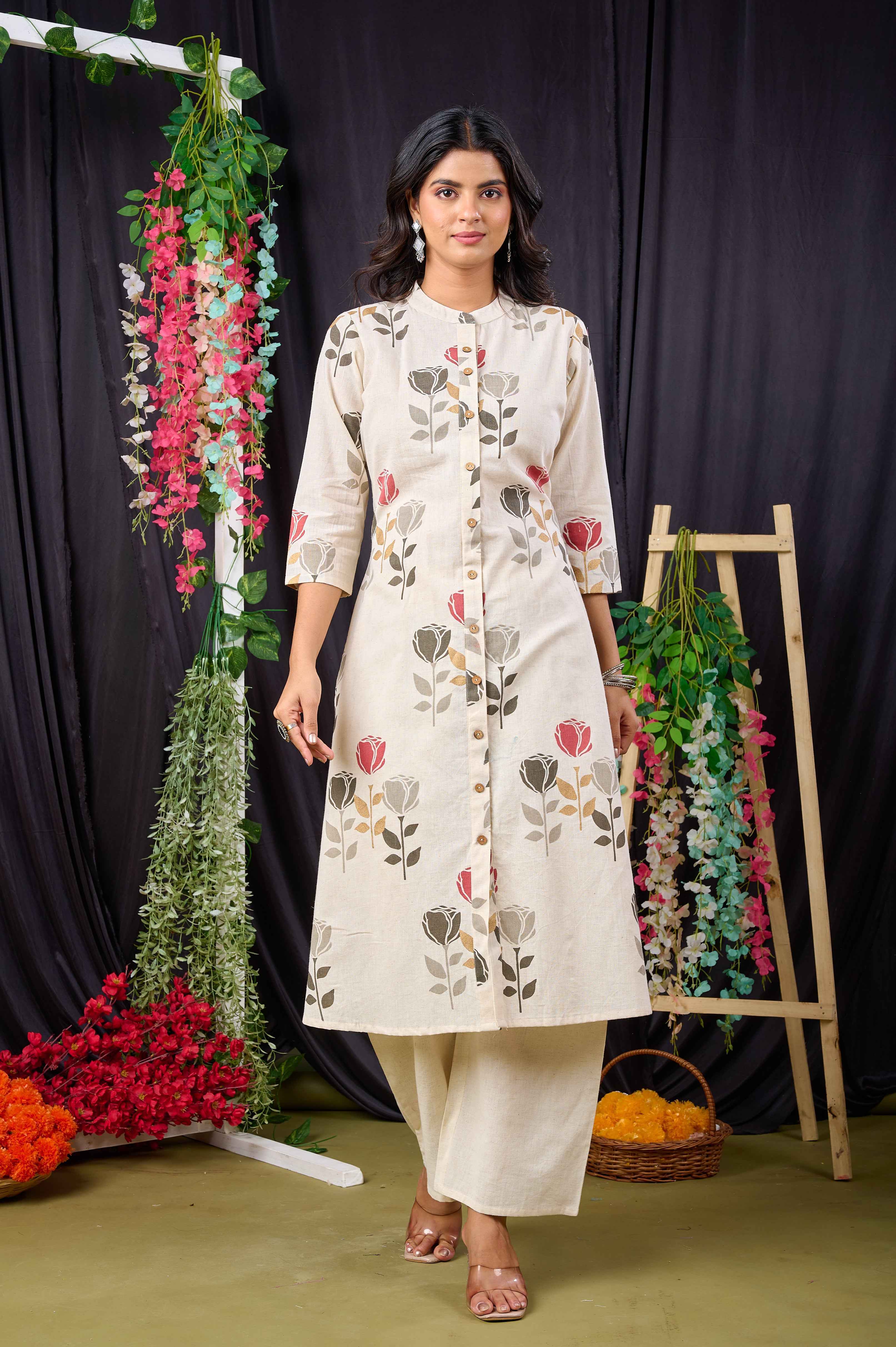 Elegant Belveera red floral print kurta with button details and three-quarter sleeves