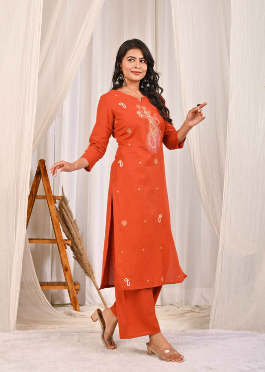 Rust floral embroidered kurta set with elegant design and comfortable fit, perfect for casual outings.