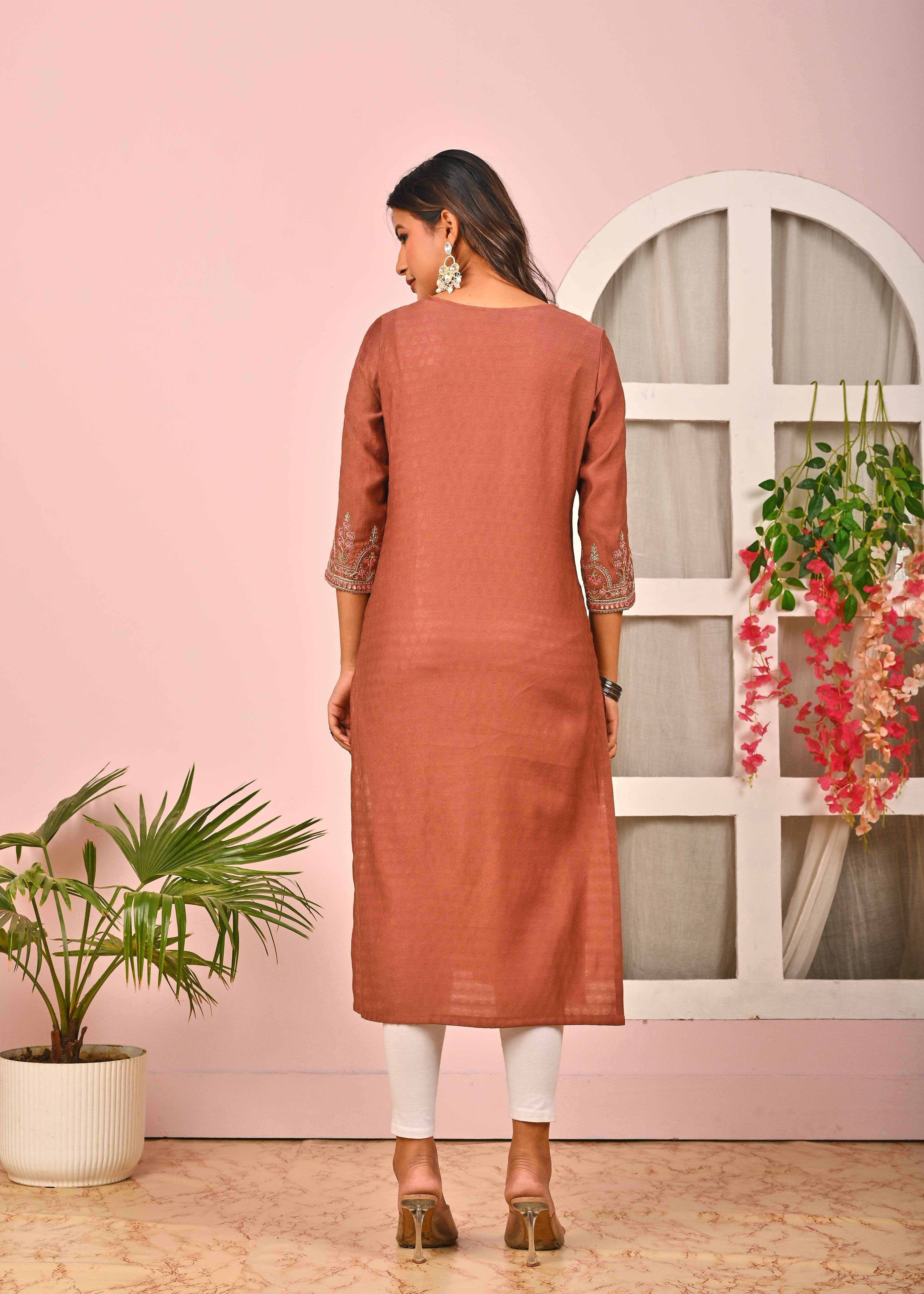 Rust orange cotton kurta with three-quarter sleeves, perfect for casual or festive occasions