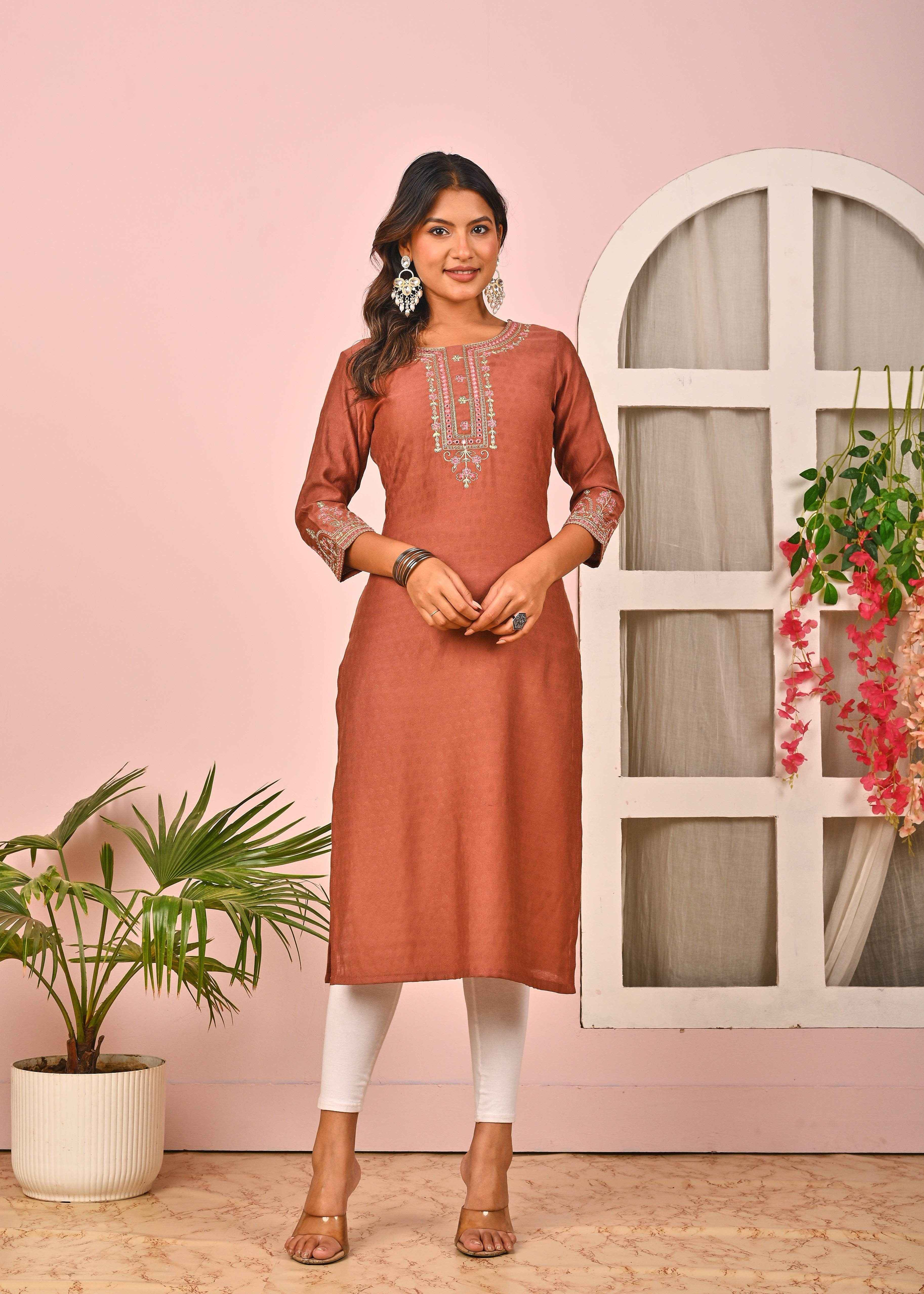 Rust orange cotton kurta by Belveera with intricate embroidery and three-quarter sleeves