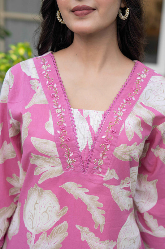 Women's traditional cotton suit in pink with floral patterns and embroidered neckline by Belveera