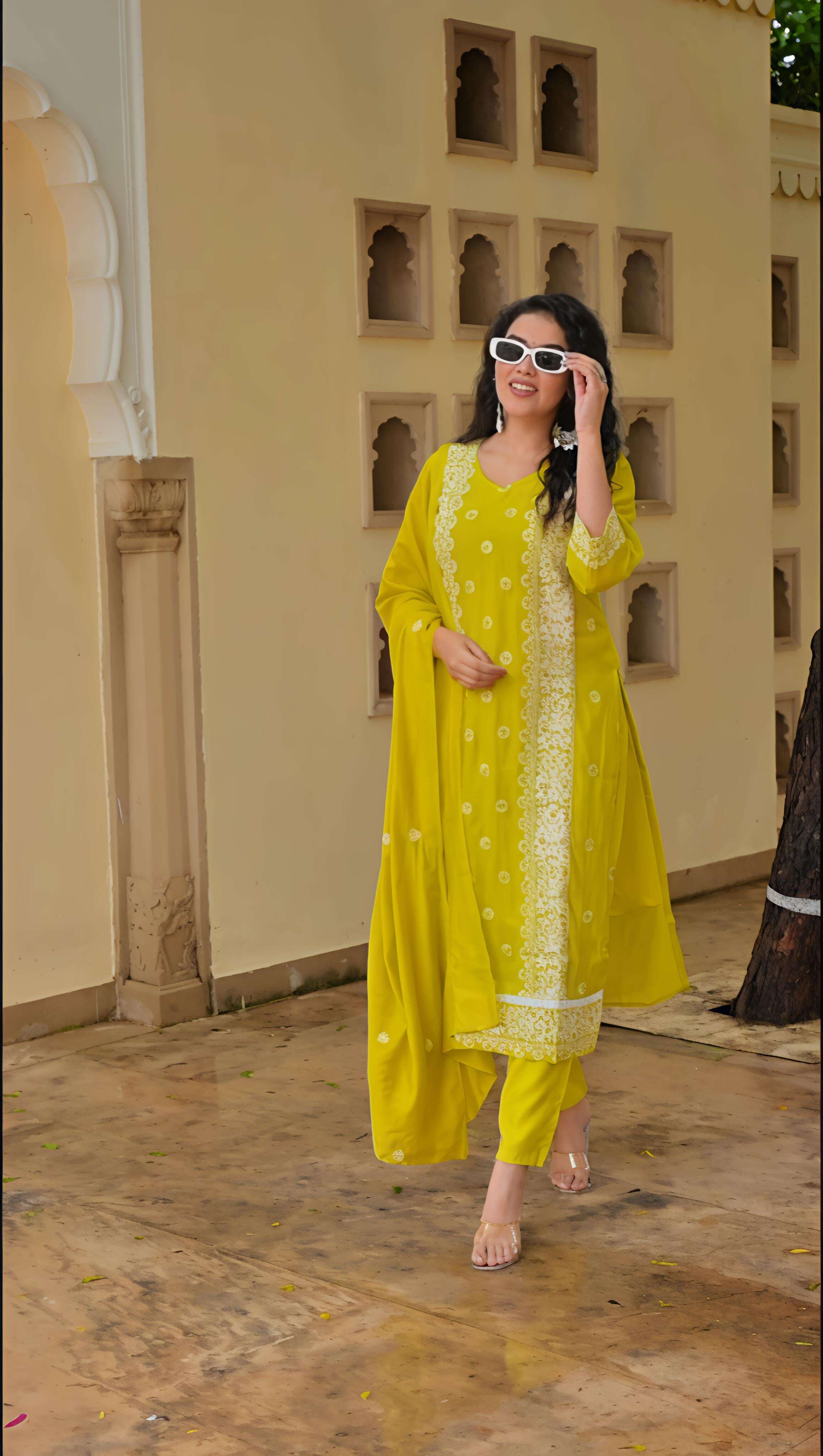 Stunning yellow kurta set for festive occasions featuring elegant embroidery and a stylish design