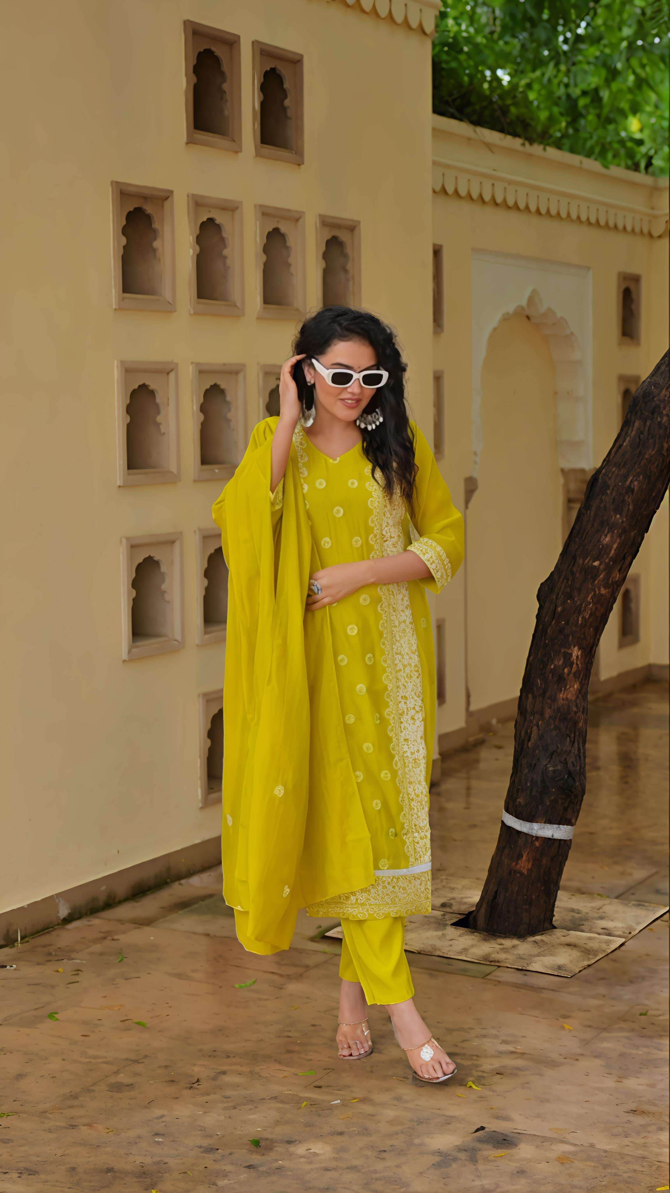 Elegant yellow kurta set for festive occasions with beautiful embroidery and lightweight fabric